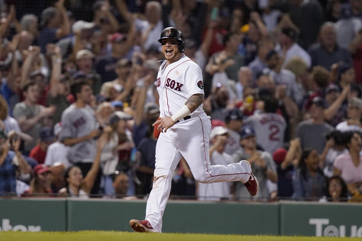 Red Sox score 9 straight, rally past Yanks 11-6 for split