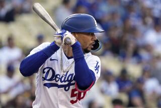  Dodgers' Mookie Betts bats during the first inning of a baseball game against the St. Louis Cardinals