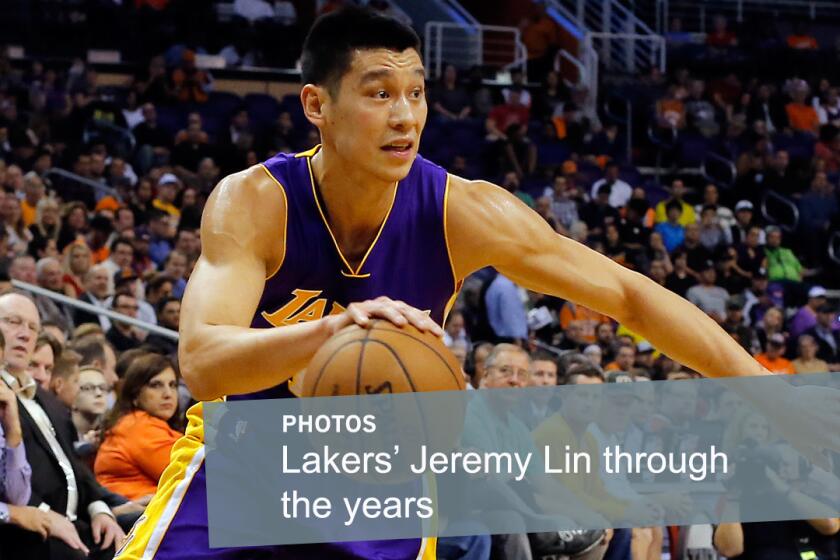 Lakers guard Jeremy Lin drives to the basket during a game against the Phoenix Suns on Jan. 19, 2015. Lin signed with the Lakers during the off-season before the 2014-15 season.