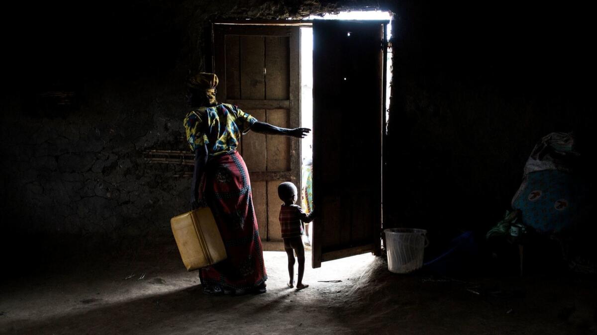 This Congolese woman and her child fled violence in northeastern Congo’s Ituri region in December. They took shelter in this church with other families.