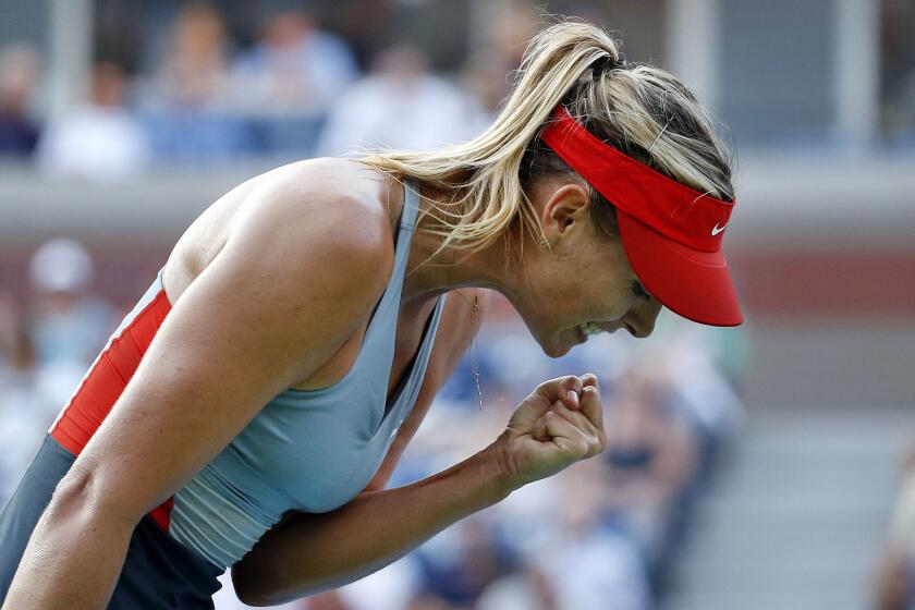 Maria Sharapova celebrates after winning a point during her second-round win over Alexandra Dulgheru at the U.S. Open on Wednesday.