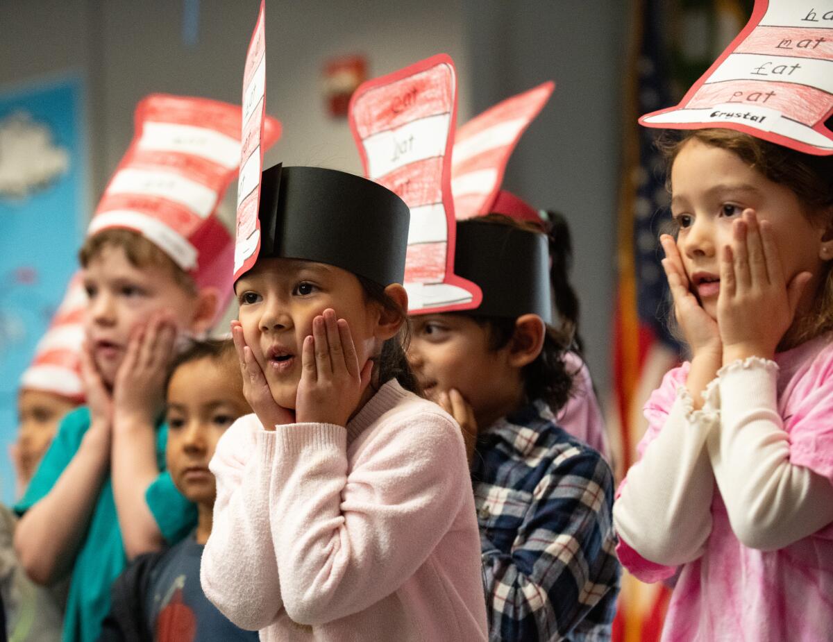 Peterson Elementary kindergarten students perform a song inspired by Dr. Seuss' "Green Eggs and Ham" on Friday.