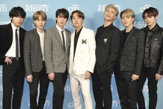 FILE - Korean pop band BTS attends the 2019 Variety's Hitmakers Brunch in West Hollywood, Calif., on Dec. 7, 2019. The South Korean boy band BTS HAS won a leading four awards including best song for “Dynamite” and best group at the MTV Europe Music Awards Sunday, Nov. 8, 2020 while Lady Gaga took home the best artist prize.(Photo by Richard Shotwell/Invision/AP, File)
