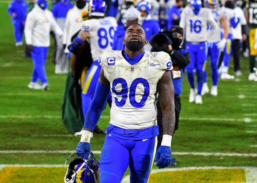 Rams defensive lineman Michael Brockers walks off the field after losing a playoff game to the Packers in January.