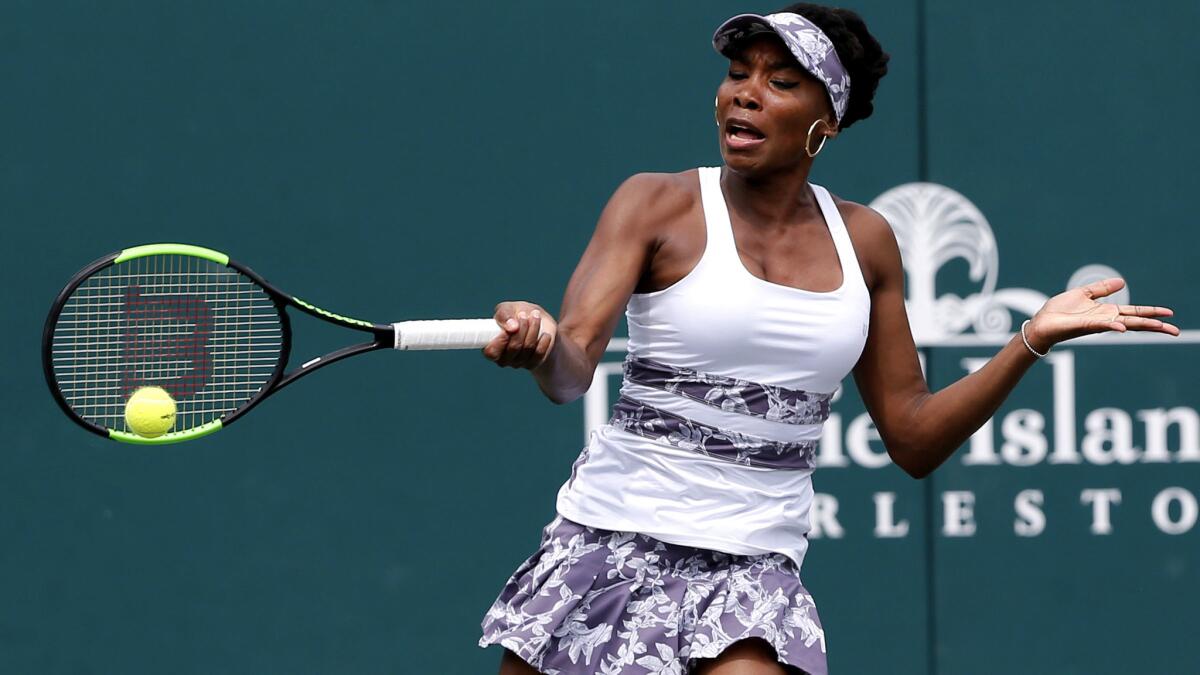 Venus Williams returns a shot against Laura Siegemund during a second-round match at the Volvo Car Open on Wednesday.