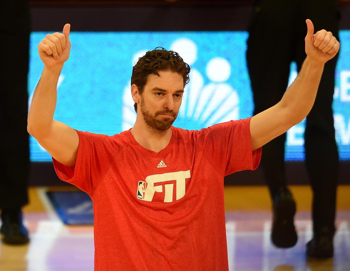 Bulls forward Pau Gasol gives the Staples Center crowd the thumbs-up sign before his first game in L.A. against the Lakers since leaving as a free agent for Chicago.