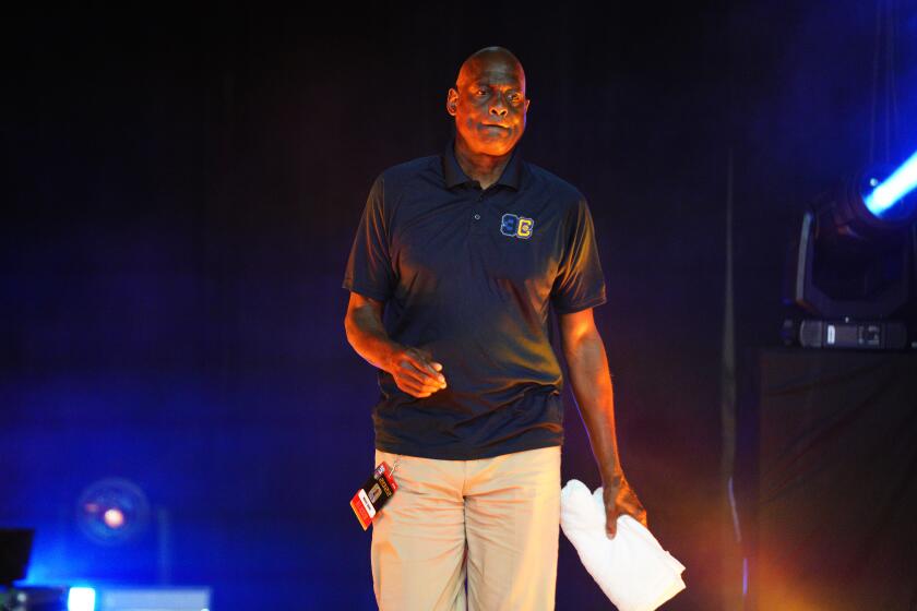 3's Company coach Michael Cooper takes the court prior to a BIG3 game against the Killer 3's at Comerica Center.