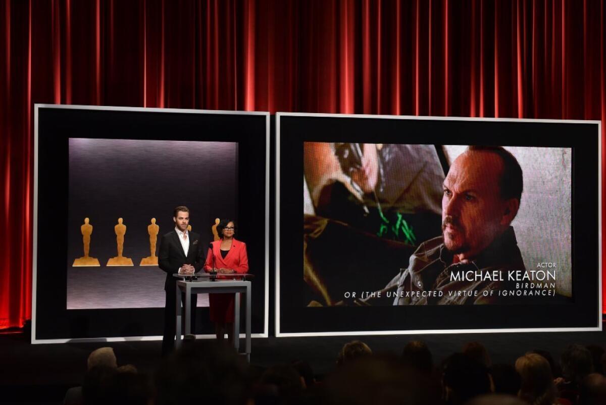 Chris Pine and academy President Cheryl Boone Isaacs announce Michael Keaton's nomination for best actor on Thursday.