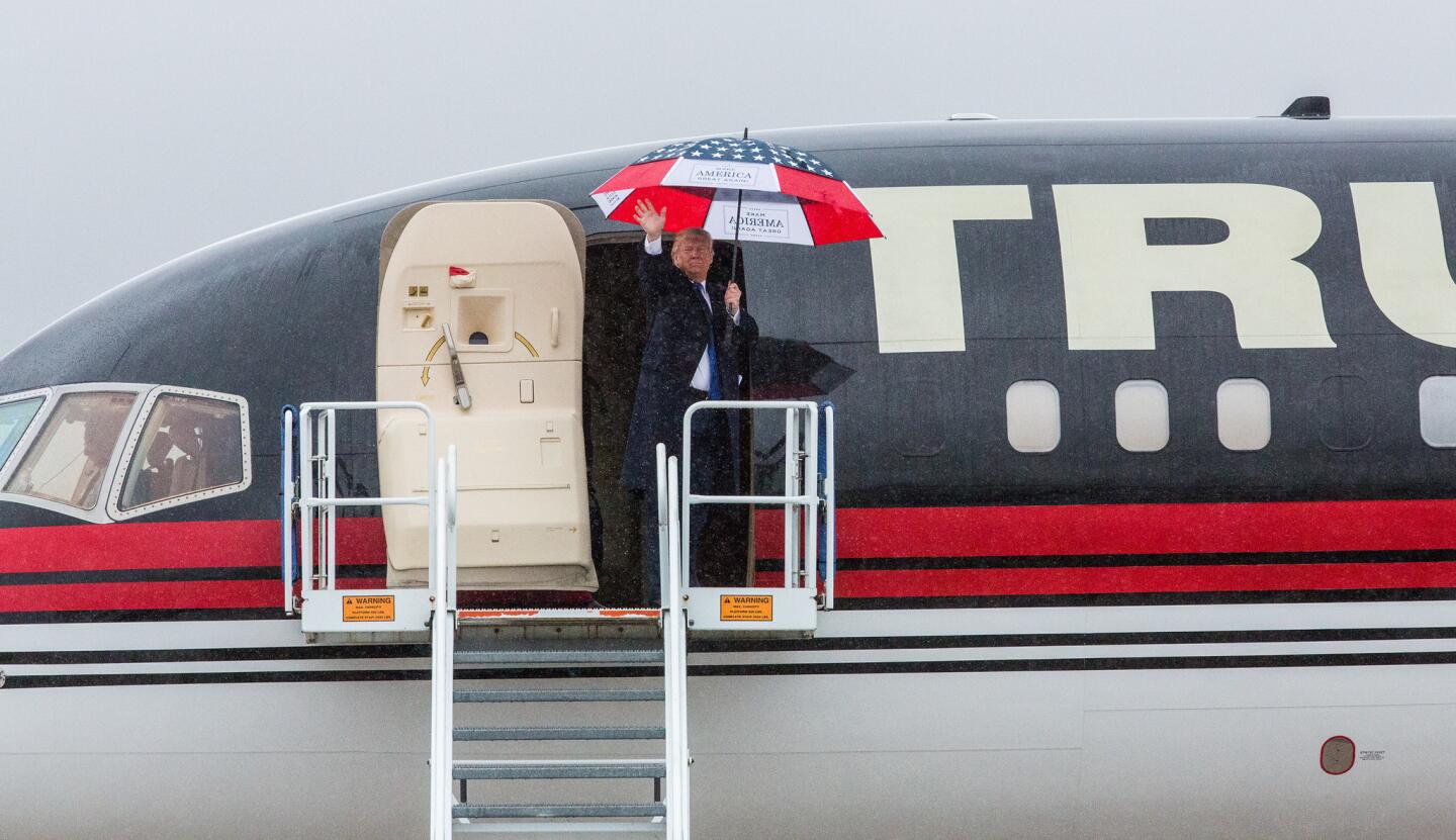 Donald Trump leaves after a rally at the Synergy Flight Center in Bloomington, Ill., on March 13, 2016.