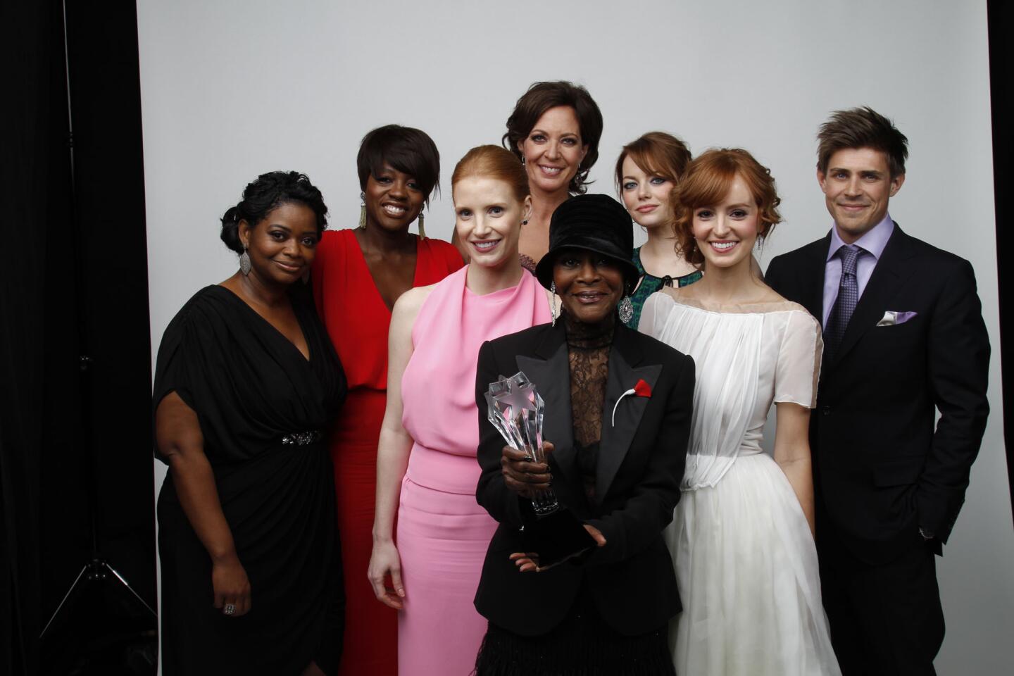 Octavia Spencer, Viola Davis, Jessica Chastain, Allison Janney, Cecily Tyson, Emma Stone, Ahna O'Reilly and Chris Lowell, from left. When they were asked who should hold the trophy, the vote was an enthusiastic and unanimous, "Cicely!!!!" Stone was especially excited to receive the award after nearly wiping out on the train of her Jason Wu dress. In short, she said, "That was terrifying!"