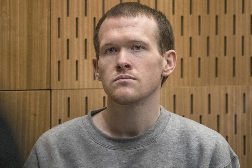 FILE - Australian Brenton Harrison Tarrant, 29, sits in the dock on the final day of his sentencing hearing at the Christchurch High Court after pleading guilty to 51 counts of murder, 40 counts of attempted murder and one count of terrorism in Christchurch, New Zealand, Aug. 27, 2020. New Zealand's Court of Appeal confirmed Tuesday, Nov. 8, 2022, that Tarrant had filed the appeal last week. The court said a hearing date has yet to be set. (John Kirk-Anderson/Pool Photo via AP, File)