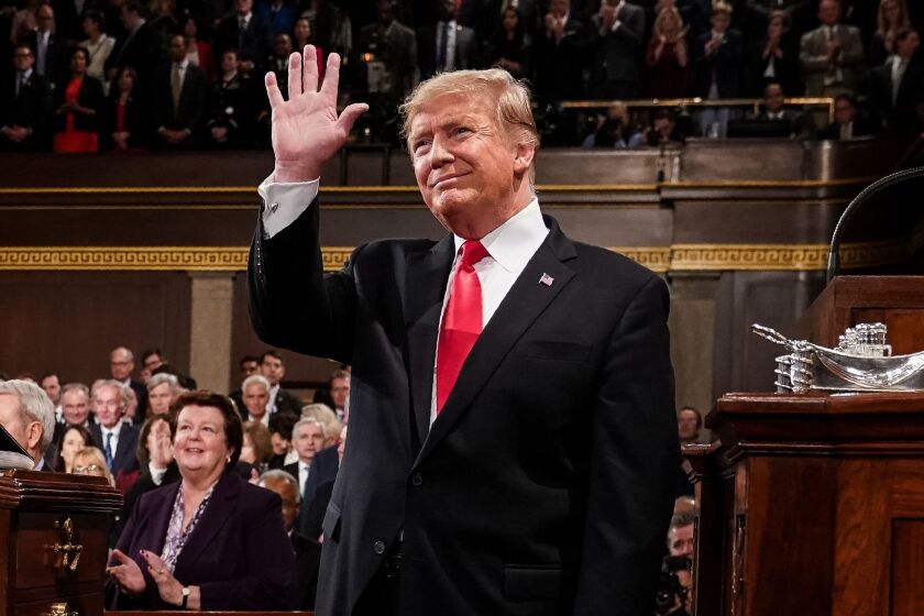 President Trump acknowledges applause before his address.