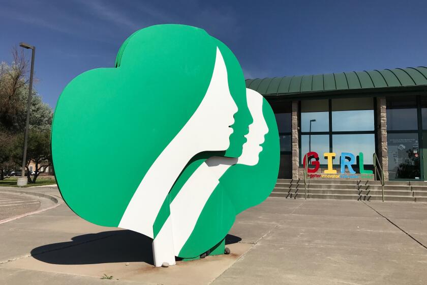 This June 7, 2021, image shows the headquarters of Girl Scouts of New Mexico Trails in Albuquerque, New Mexico. Rebecca Latham, CEO of Girl Scouts of New Mexico Trails, said her council had thousands of boxes left over at the end of the selling season in late spring, even though girls tried innovative selling methods like drive-thru booths and contact-free delivery. (AP Photo/Susan Montoya Bryan)