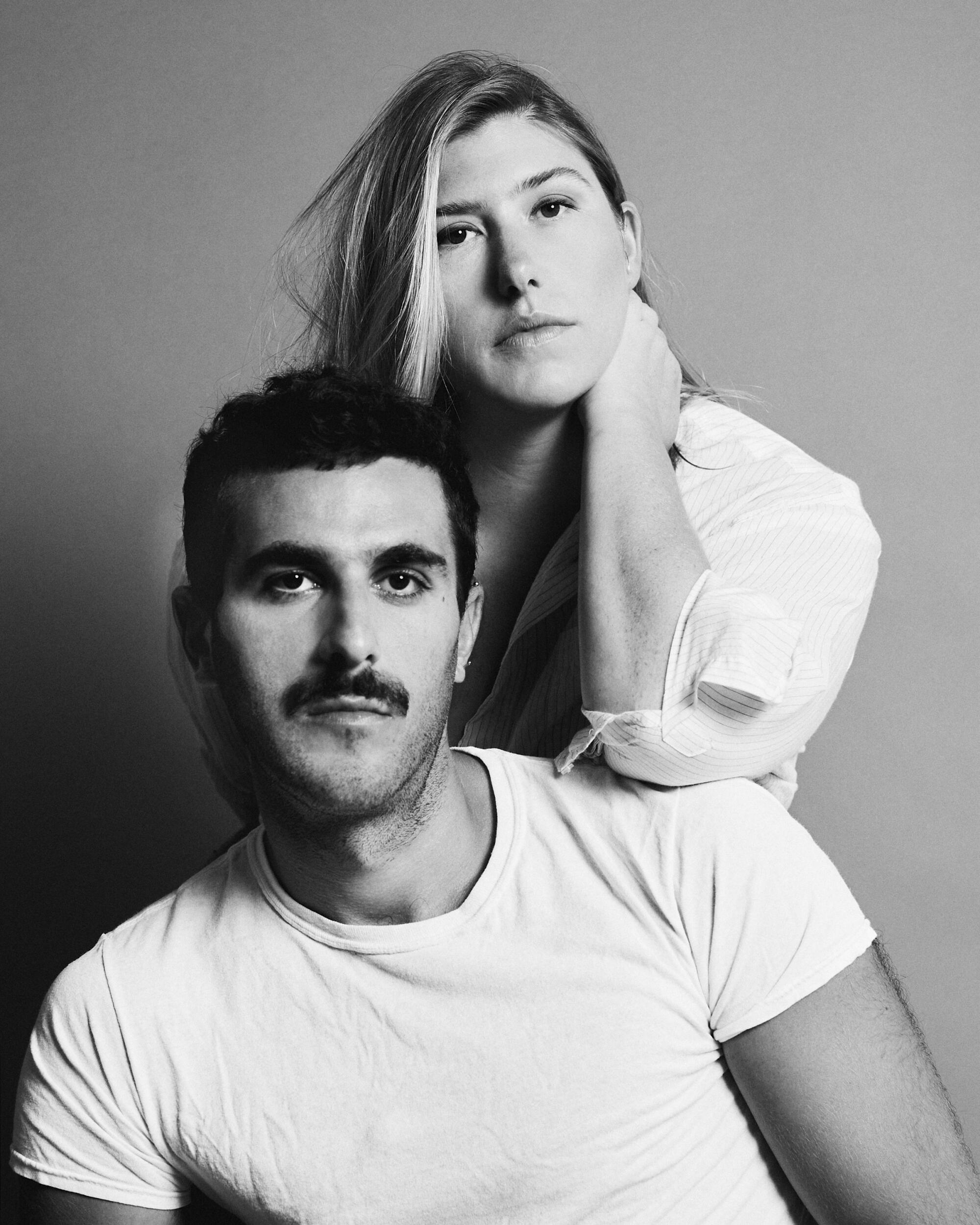 black and white photo of designers Mike Eckhaus and Zoe Latta