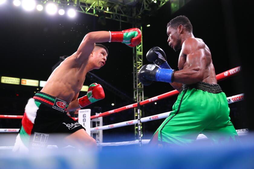 CARSON, CA - SEPTEMBER 14: Jaime Munguia (L) punches Patrick Allotey (R) during their super welterweight bout at the Dignity Health Sports Park on September 14, 2019 in Carson, California. (Photo by Tom Hogan/Golden Boy/Getty Images)