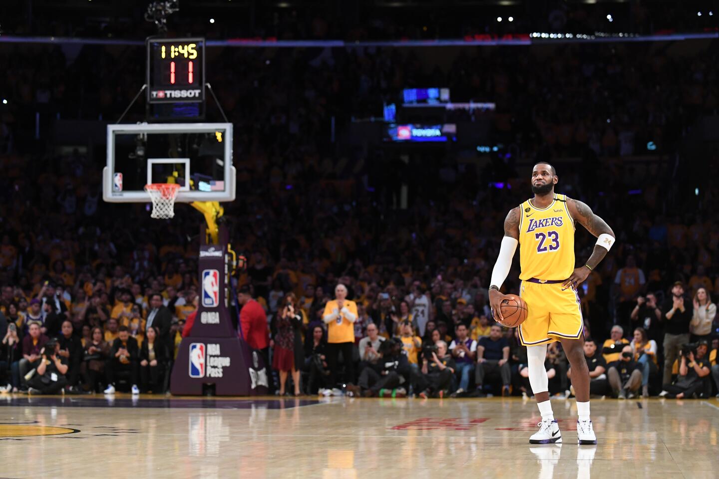 LeBron James holds the ball and lets the 24-second shot clock expire as a tribute to Kobe Bryant to begin a game against the Trail Blazers on Jan. 31 at Staples Center.