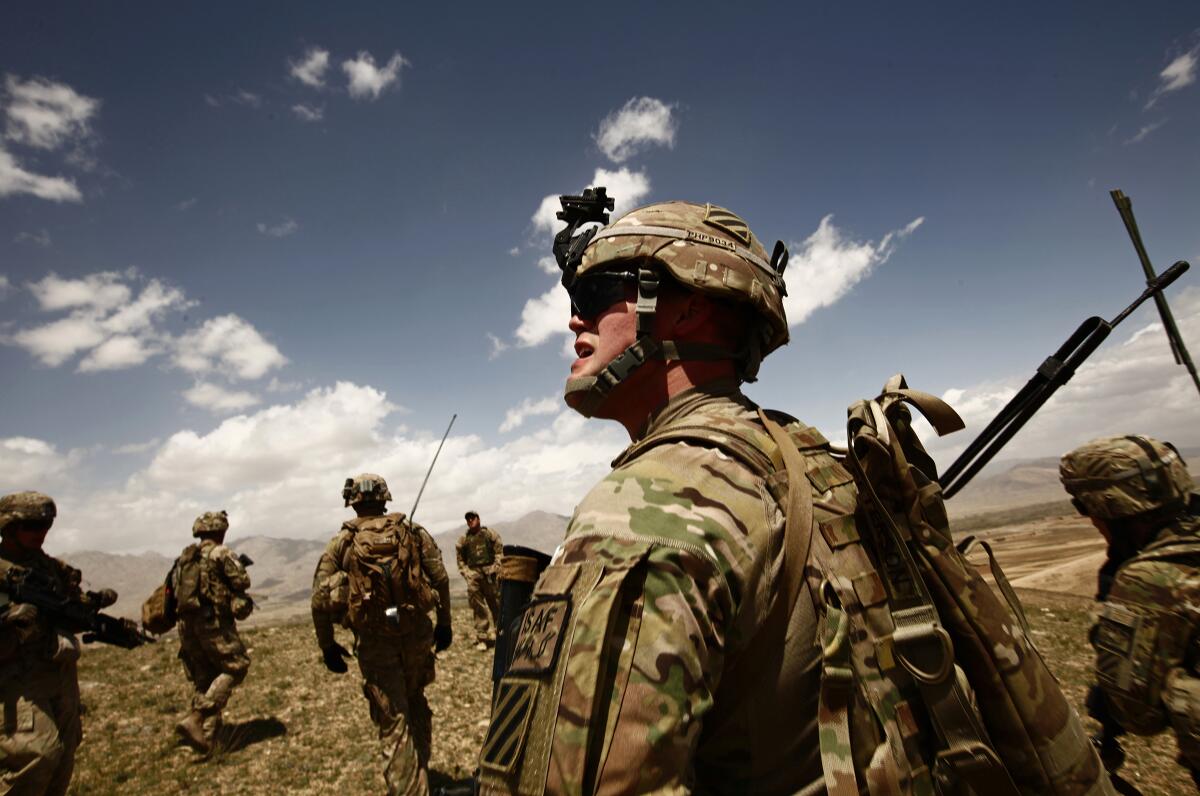 U.S. soldiers take part in an operation in support of Afghan forces in Wardak Province, Afghanistan, in 2013.