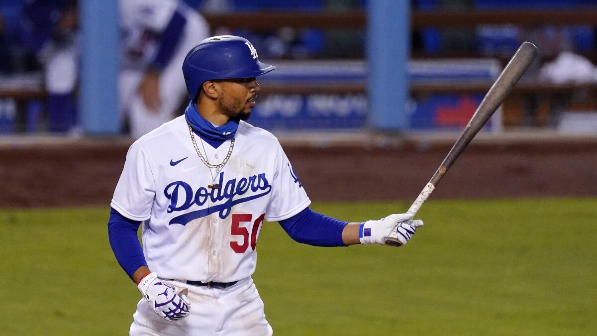 Dodgers' Mookie Betts bats against the San Diego Padres.