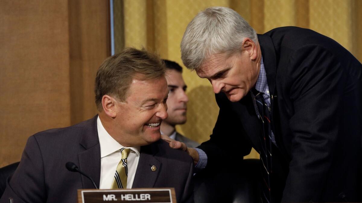 Why is this man laughing? Sen. Dean Heller, R-Nev., who is sponsoring an Obamacare repeal bill even though his home state will be the biggest percentage loser of funding, shared a companionable moment last week with co-sponsor Bill Cassidy, R-La.