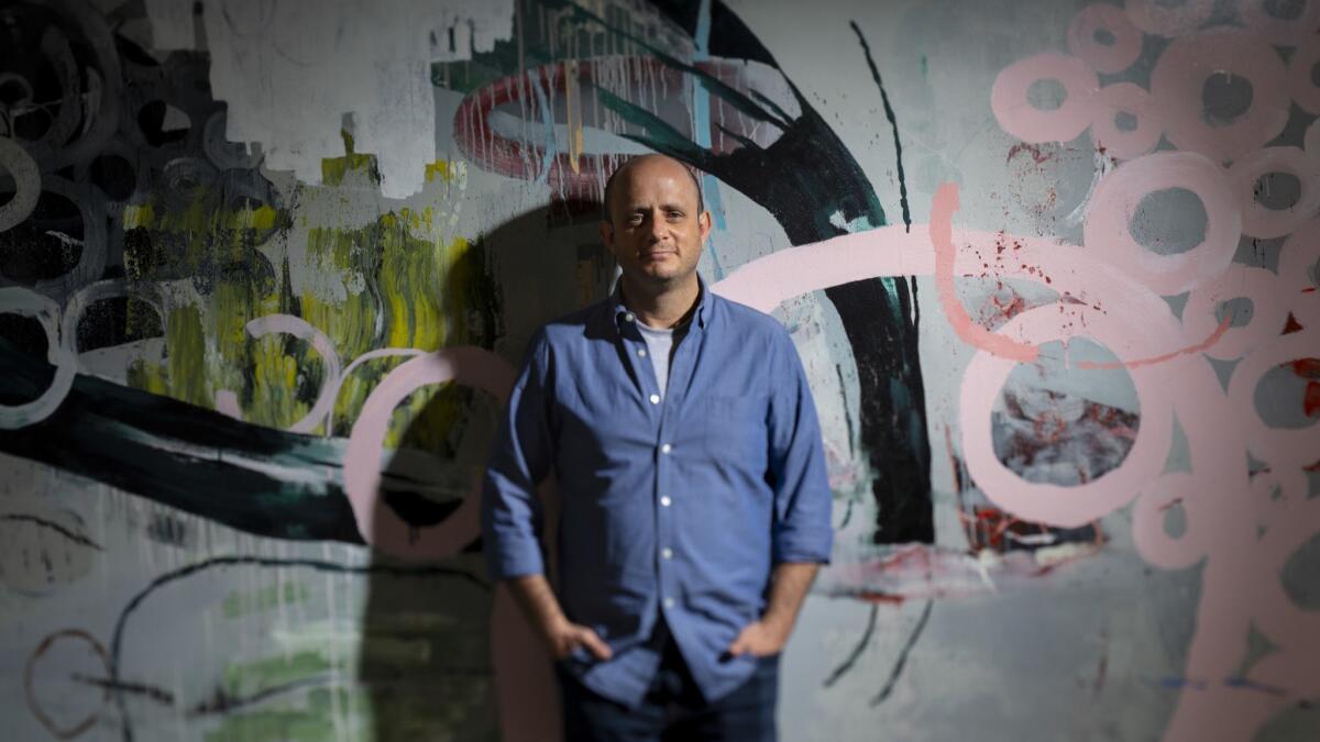 Eric Kripke, co-creator of the science fiction time-travel series, "Timeless," as well as behind the shows "Supernatural" and "Revolution," is photographed at his production office in Santa Monica.
