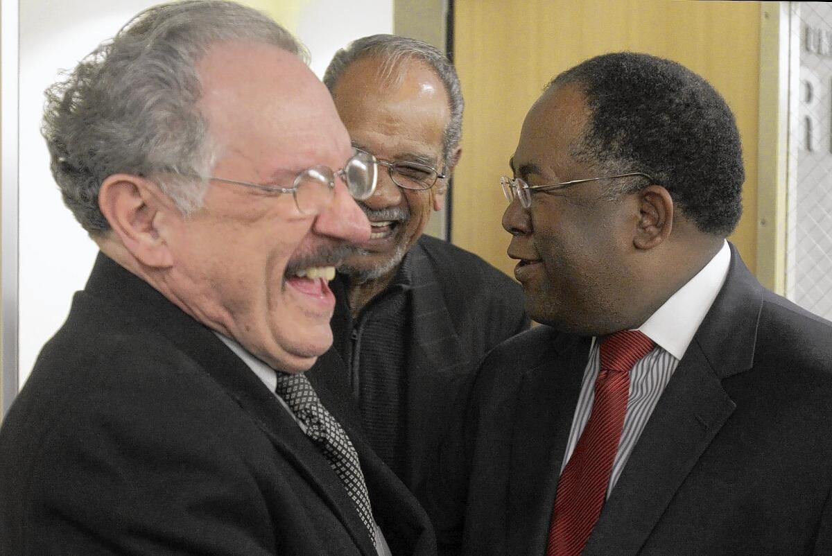 George McKenna, left, in January 2013 with former Inglewood school board member Larry Aubry, center, and county Supervisor Mark Ridley-Thomas, before Ridley-Thomas' deputy Alex Johnson and McKenna wound up running against each other for an L.A. Unified school board seat.