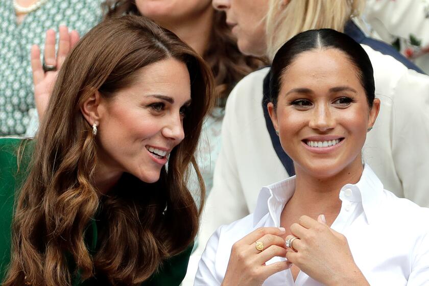 Britain's Kate, Duchess of Cambridge and Meghan, Duchess of Sussex