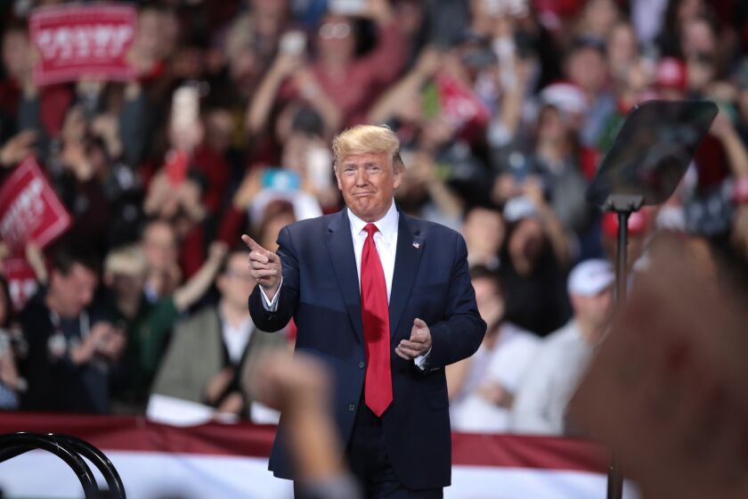BATTLE CREEK, MICHIGAN - DECEMBER 18: President Donald Trump hosts a Merry Christmas Rally at the Kellogg Arena on December 18, 2019 in Battle Creek, Michigan. While Trump spoke, the House of Representatives was voting on two articles of impeachment, deciding if he will become the third president in U.S. history to be impeached. (Photo by Scott Olson/Getty Images) ** OUTS - ELSENT, FPG, CM - OUTS * NM, PH, VA if sourced by CT, LA or MoD **