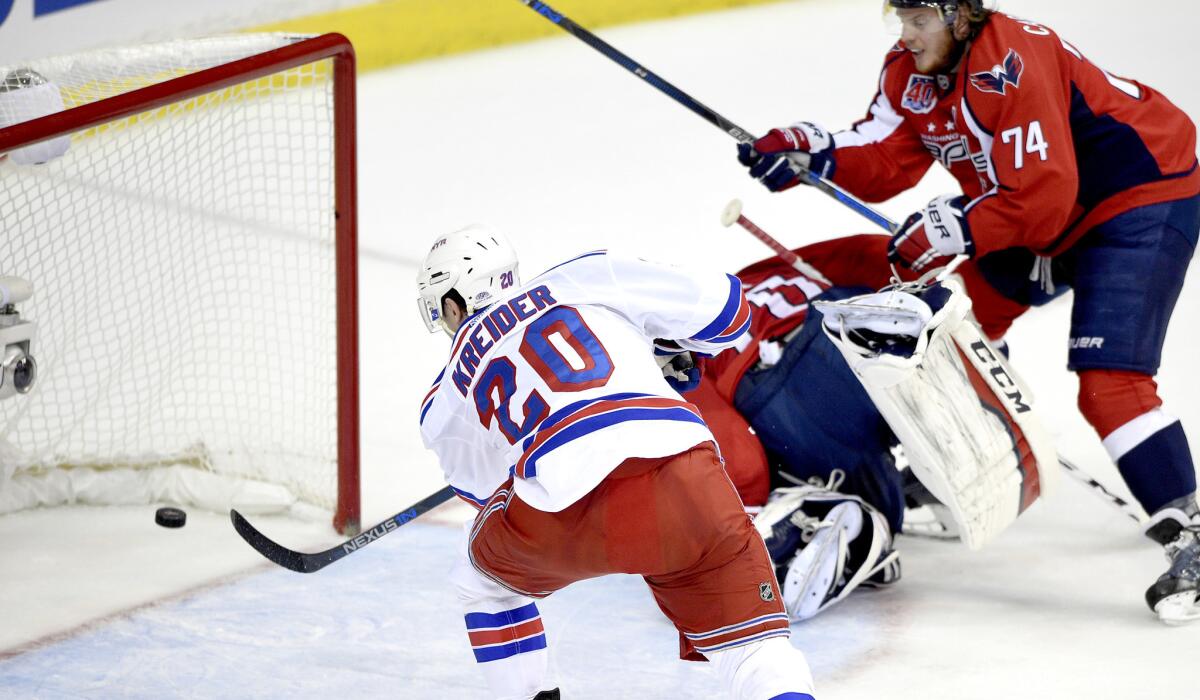 Rangers left wing Chris Kreider (20) scores his second goal of the first period against the Capitals in Game 6 on Sunday night in Washington.