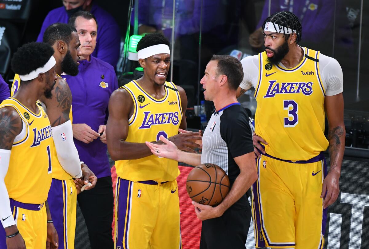 Lakers guard Rajon Rondo (9) has a few words for an official during Game 1 of the NBA Finals.