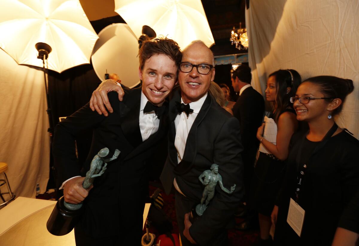 Eddie Redmayne, left, and Michael Keaton at the 21st Screen Actors Guild Awards.