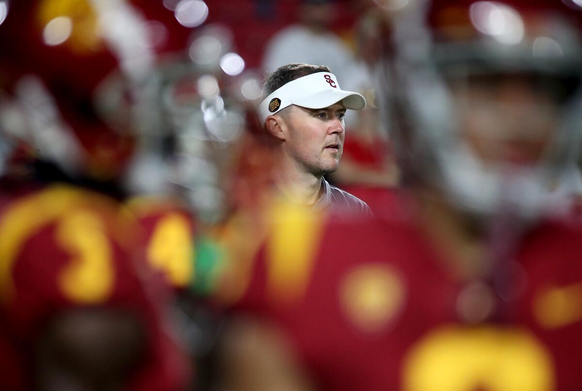USC coach Lincoln Riley directs pregame warmups before a win over Fresno State on Sept. 17.