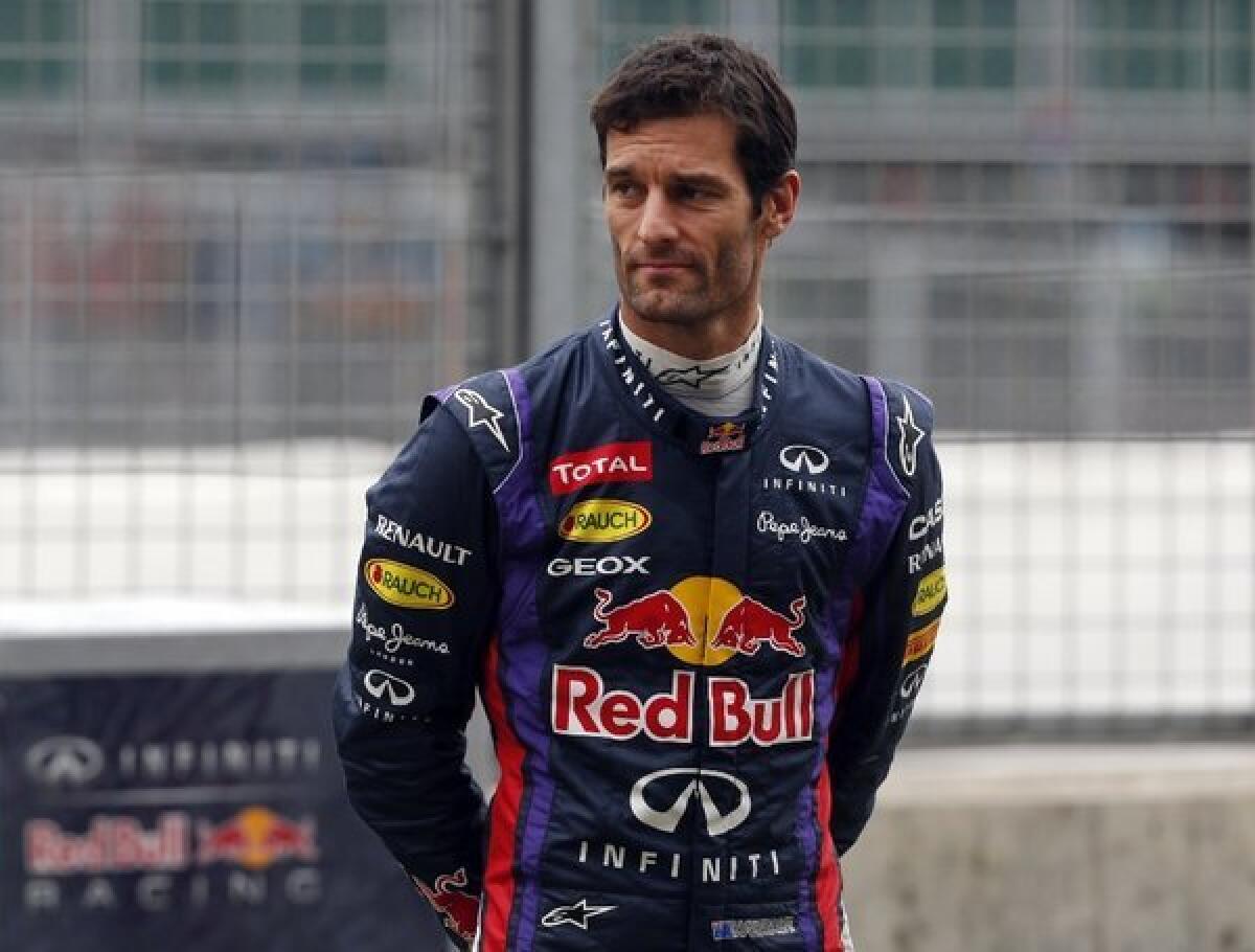 Red Bull driver Mark Webber of Australia watches practice Friday for Sunday's British Grand Prix at the Silverstone circuit.
