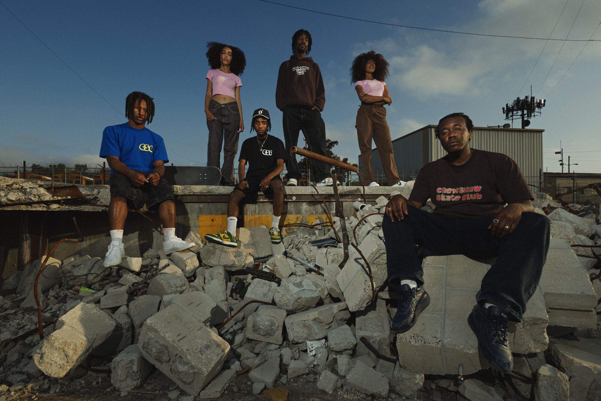 Models wearing Crenshaw Skate Club clothes.