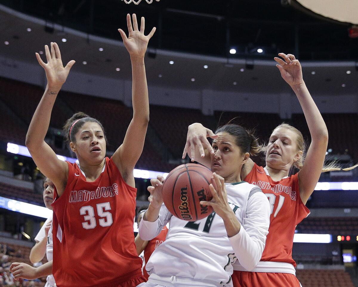 Cal State Northridge's Caroline Giling and Jasmine Johnson, right, surround Hawaii's Shawna-Lei Kuehu during the Big West Conference final on March 14. Cal State Northridge will face Stanford in the first round of the NCAA tournament.