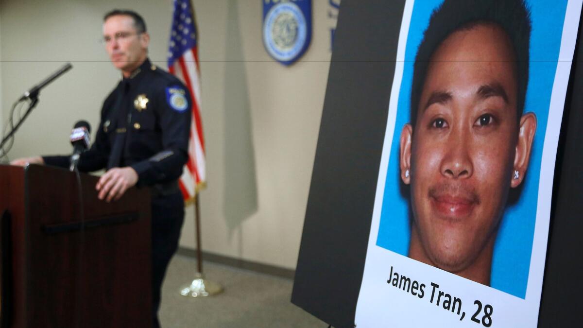 Sacramento Police Chief Sam Somers Jr., left, announces the arrest of James Tran, who was charged with the attempted killing of Spencer Stone during an altercation.