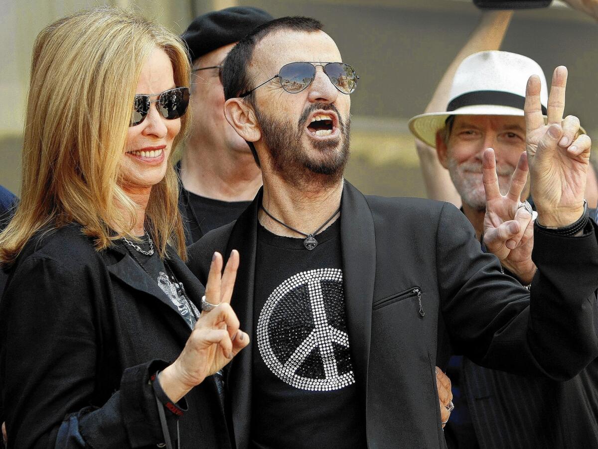 Ringo Starr celebrates his 74th birthday with his wife Barbara Bach in front of the Capitol Records Building.