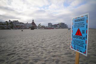 Coronado, CA - July 02: On Saturday, July 2, 2022 in Coronado, CA., posted signs at Coronado Beach warn the public, “Warning Beach Water May contain Sewage And May Cause Illness.” (Nelvin C. Cepeda / The San Diego Union-Tribune)