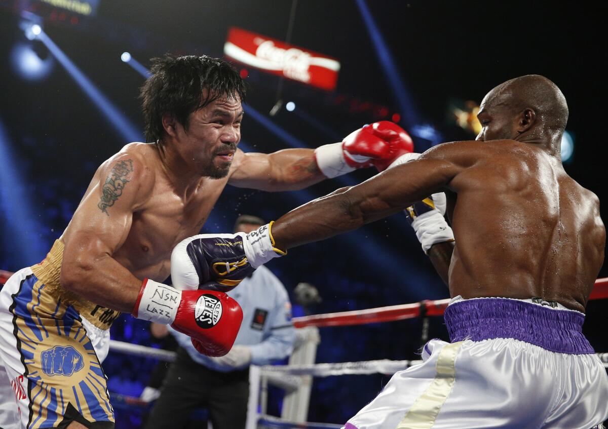 Manny Pacquiao goes on the attack against Timothy Bradley during their WBO welterweight title bout at the MGM Grand on Apr. 9.