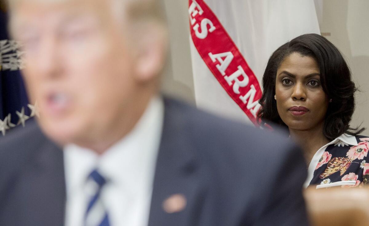 Omarosa Manigault Newman with President Trump at the White House in 2017.