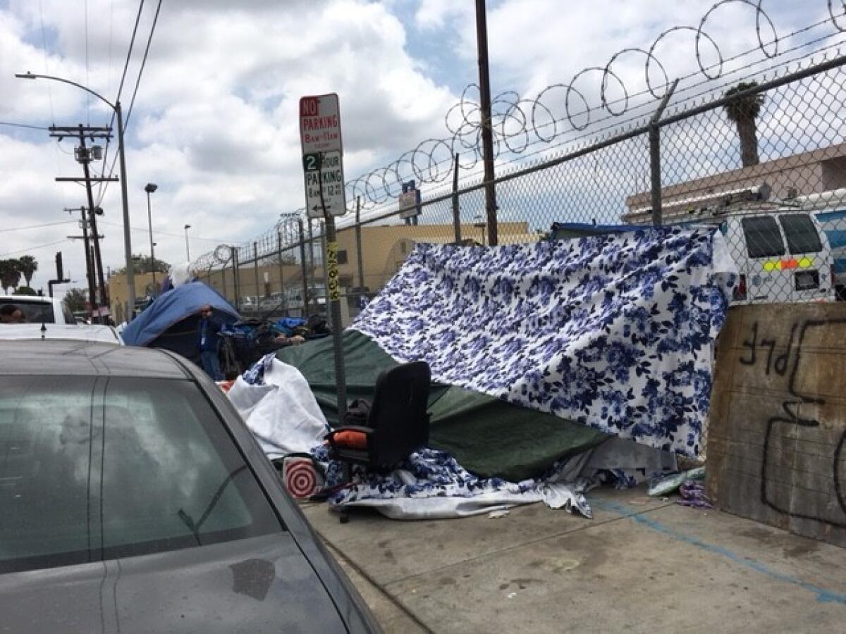 An encampment of homeless people in downtown Los Angeles, near where the latest homelessness statistics were announced Thursday.