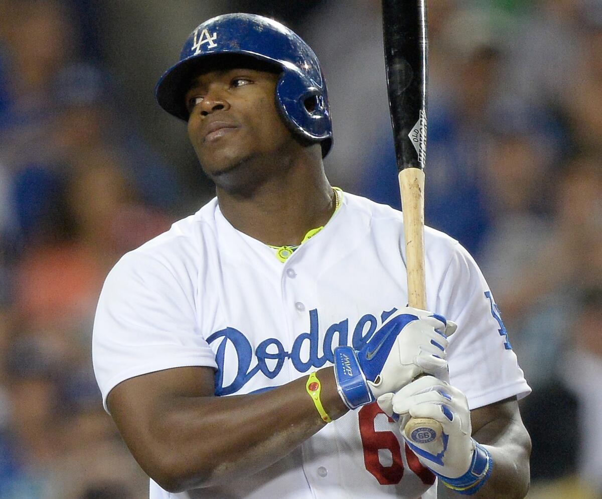 Dodgers right fielder Yasiel Puig reacts after striking out during the sixth inning of the Dodgers' 7-0 loss to the Philadelphia Phillies on Monday.