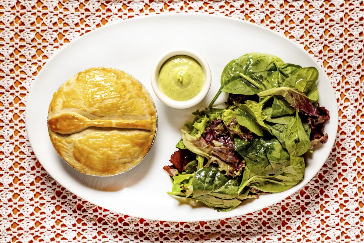 Chicken pot pie served with salad