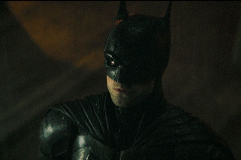 It's a warning: Robert Pattinson as "The Batman" in the upcoming movie's first trailer in more than a year.