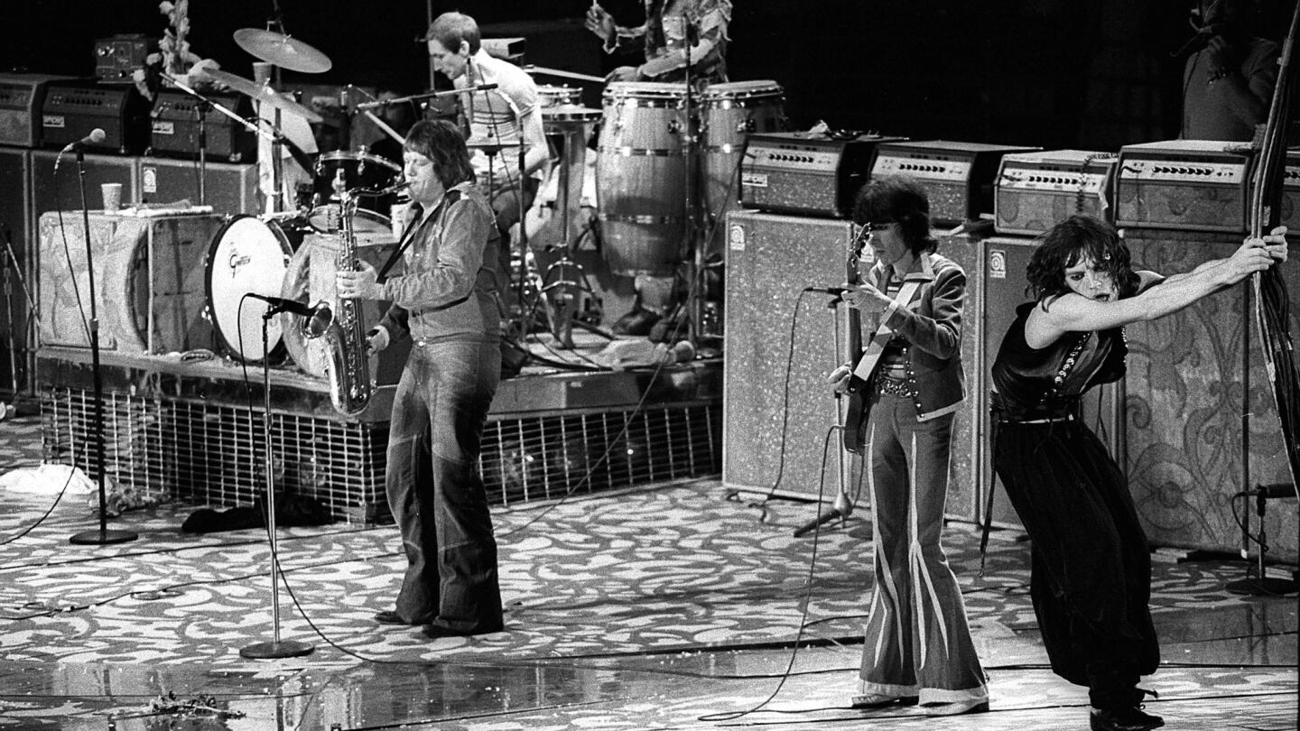 Bobby Keys and The Rolling Stones perform at the Inglewood Forum in 1975.