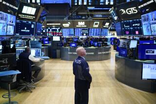 Traders work on the floor at the New York Stock Exchange in New York, Thursday, Dec. 29, 2022. (AP Photo/Seth Wenig)