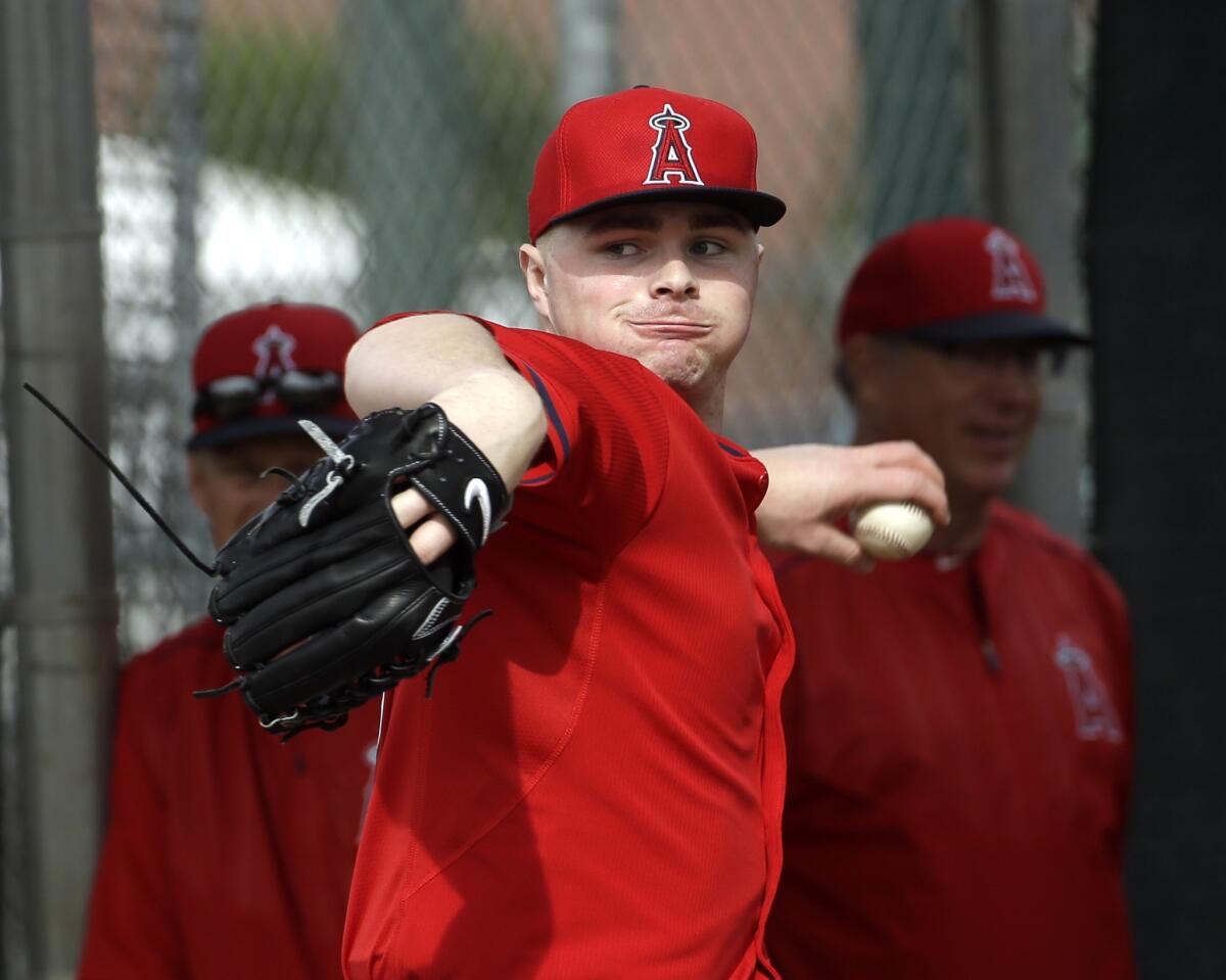 Angels pitcher Sean Newcomb throws during a workout on Feb. 20 in Tempe, Ariz.
