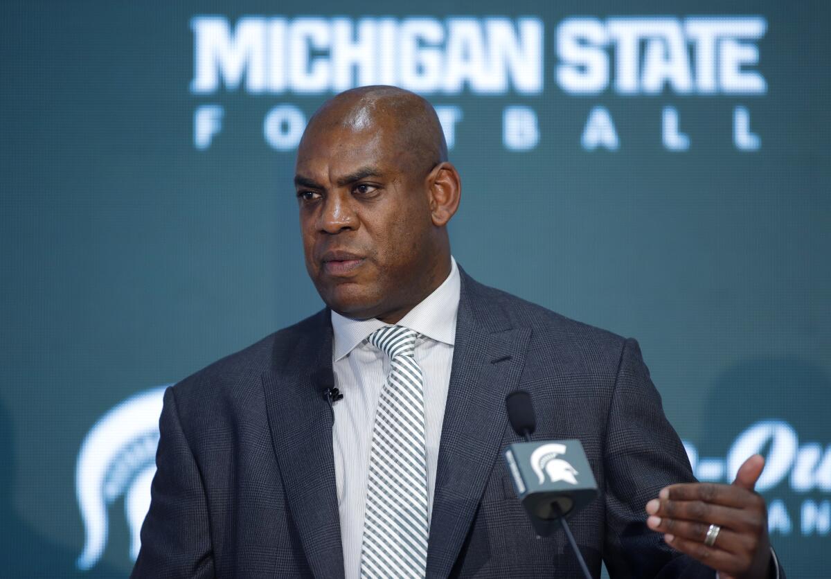 Michigan State coach Mel Tucker speaks during a news conference