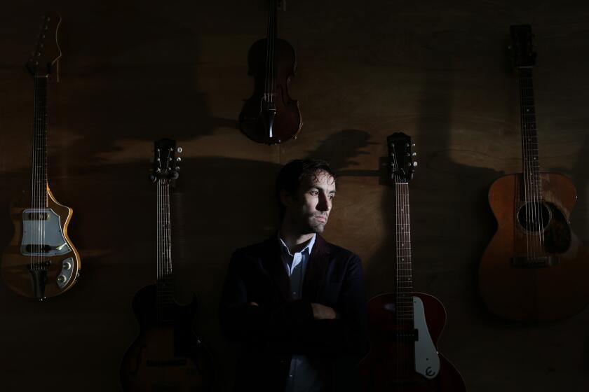 Violinist and composer Andrew Bird at his home in Los Feliz. Bird is preparing for an upcoming tour and has a new album, "Are you Serious", out on April 1.