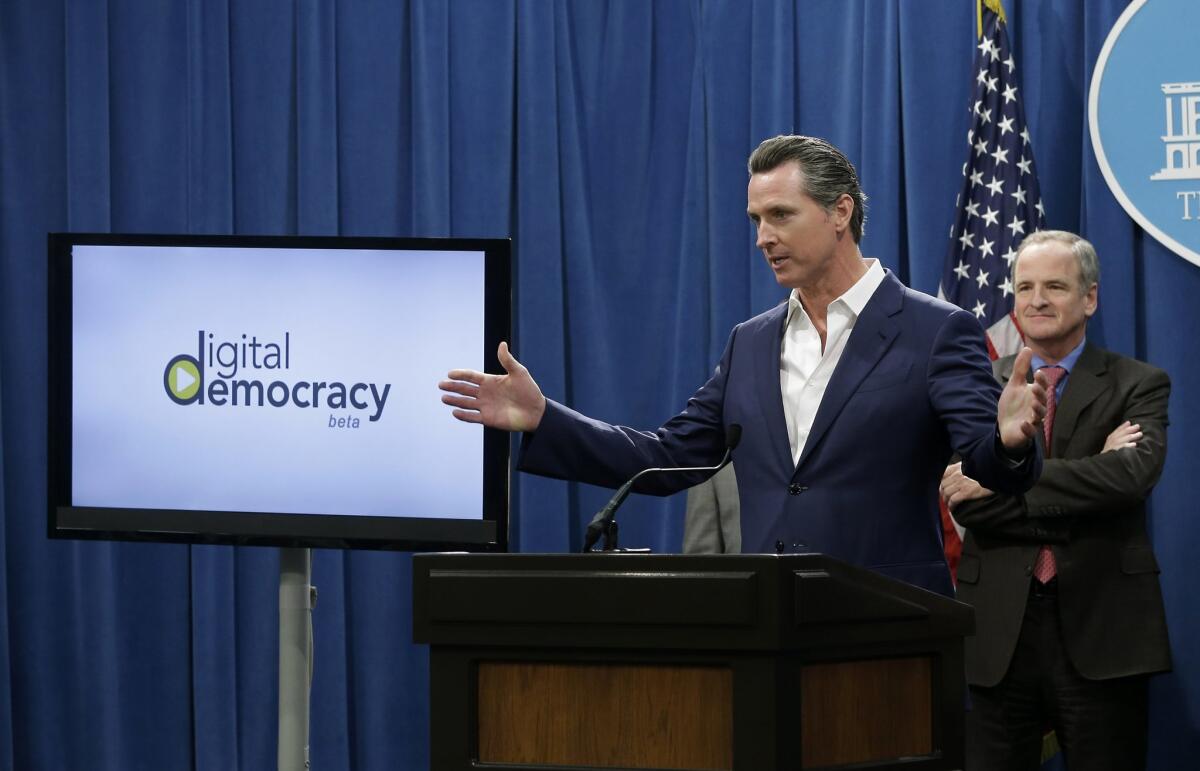 Lt. Gov. Gavin Newsom discusses a new video search engine that allows the public to to track legislative hearings during a news conference in Sacramento on May 6.