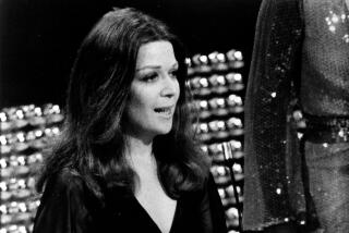 Treva Silverman accepts the "Super Emmy" for writing in comedy at the 1974 Primetime Emmy Awards.